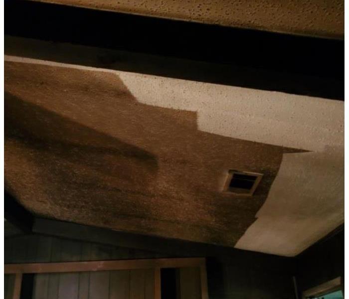 Recent fire in this home left damage on this ceiling.