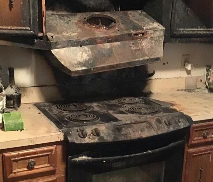 A stove that was involved in a house fire.